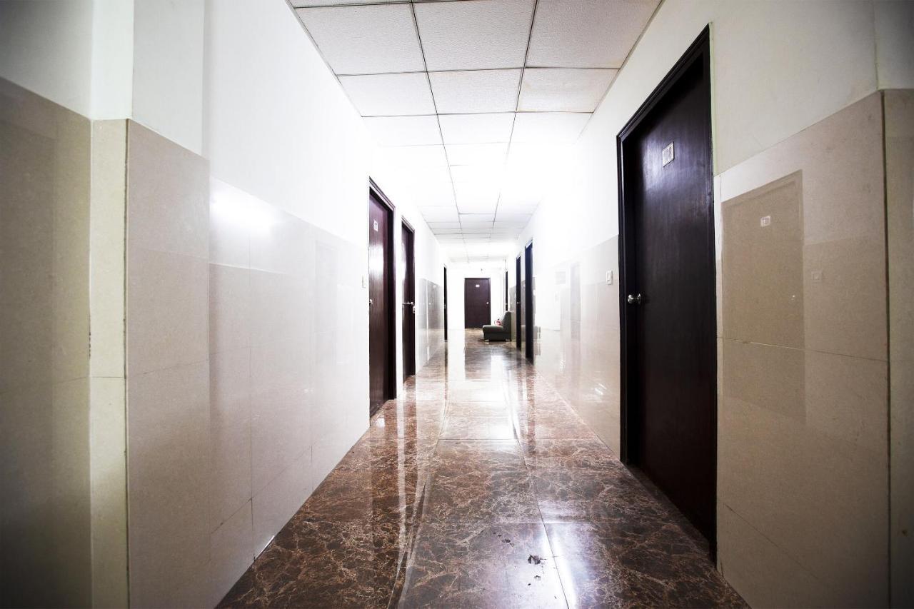 Oyo 44174 Hotel Mid Town Prime Harthala Bagian luar foto