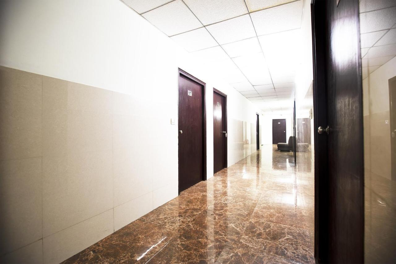 Oyo 44174 Hotel Mid Town Prime Harthala Bagian luar foto