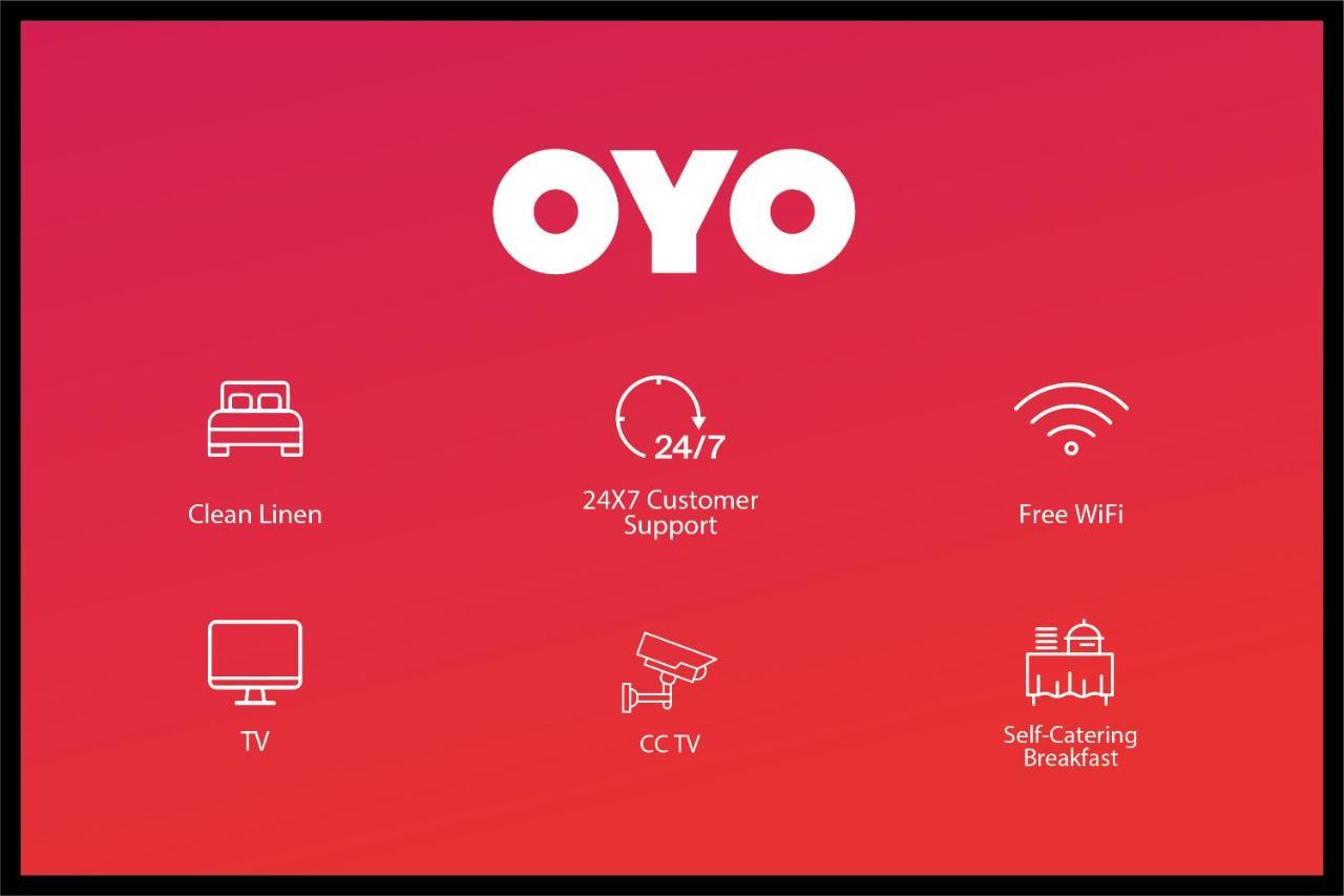 Oyo 44174 Hotel Mid Town Prime Harthala Bagian luar foto
